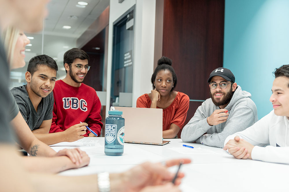 Group of students listening to instructor