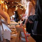 People browsing zines